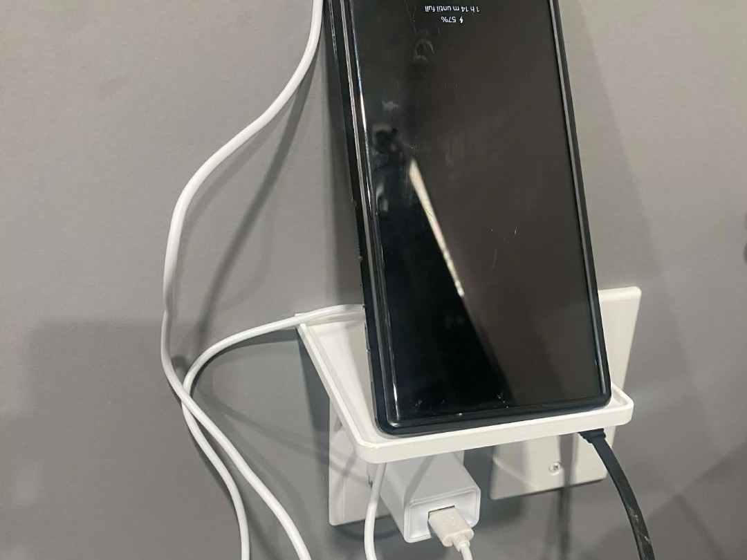 Single outlet switch with shelf and hole for cords