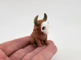 Миниатюрна фигурка на бик с череп