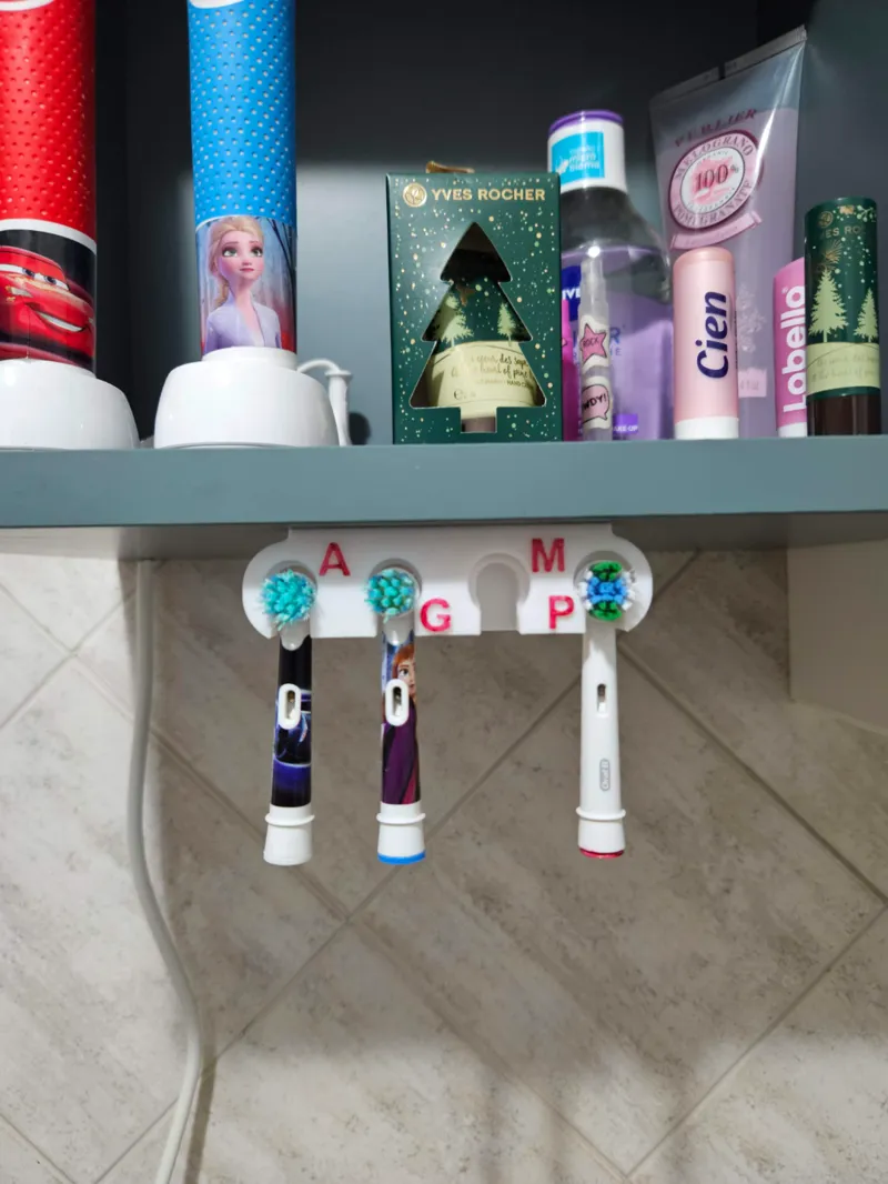 Electric toothbrush head holder