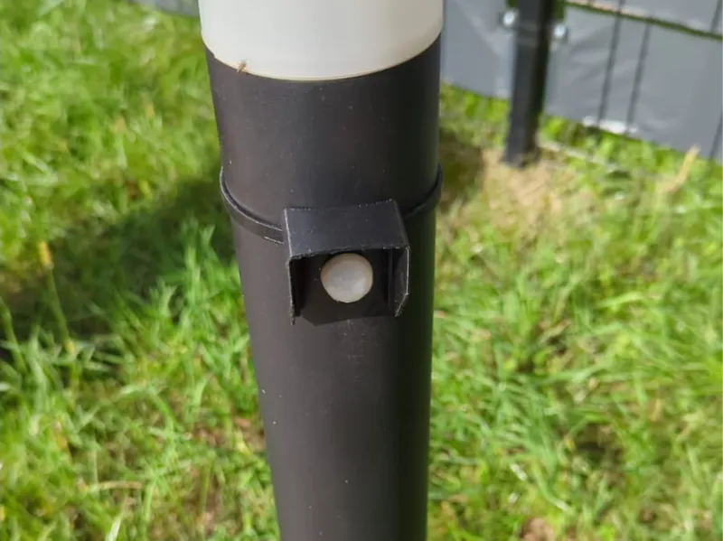 Motion sensor cover for lamp