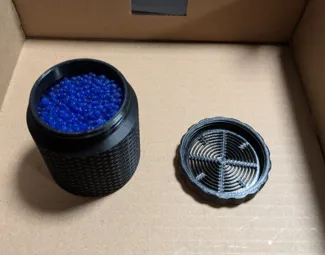 Dessicant container for Eryone spools