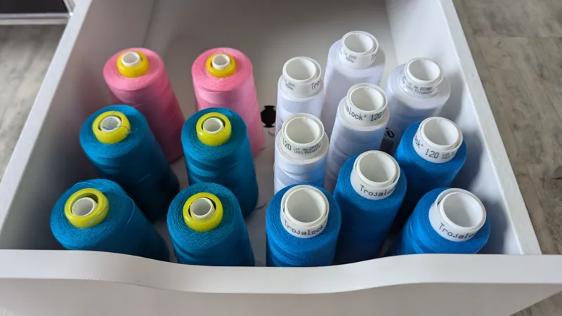 Sewing bobbin base
