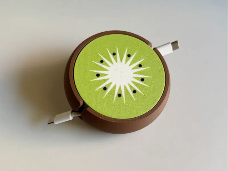 Kiwi, portable cable winder organizer.