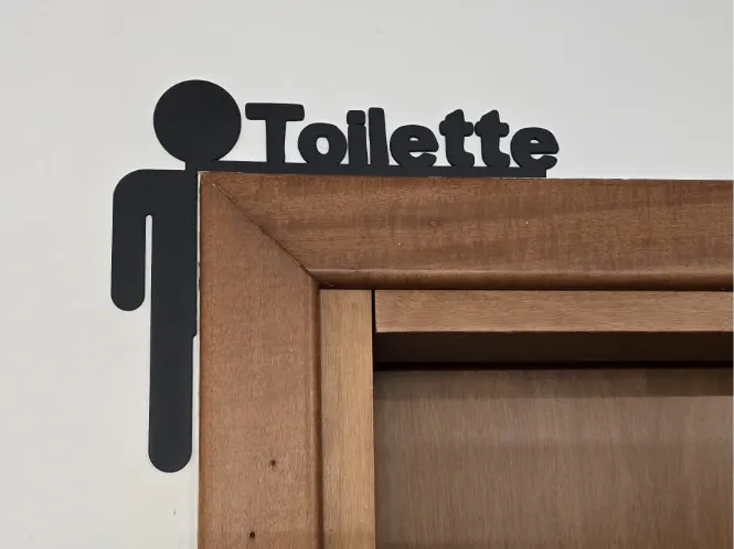 Toilette Uomo decorazione sopra porta