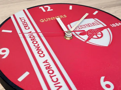 Wall clock with the Arsenal logo