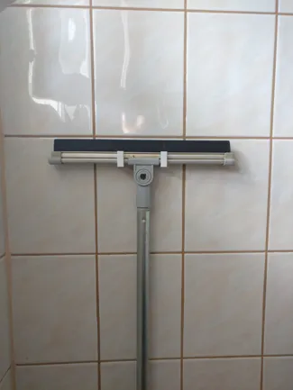 Squeegee wall holder