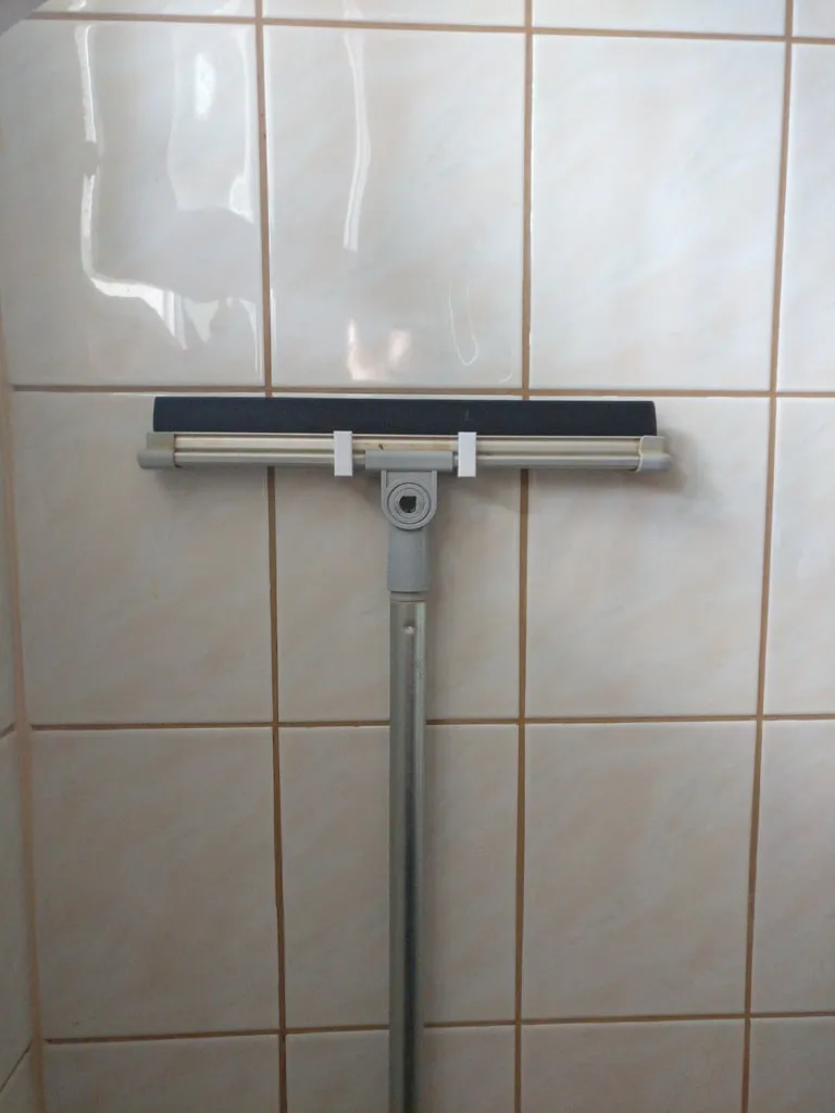 Squeegee wall holder
