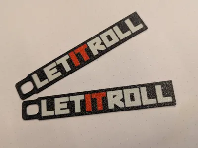 LET IT ROLL keyring