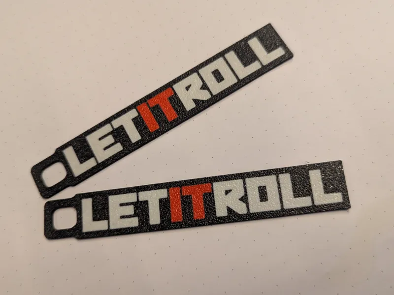 LET IT ROLL keyring