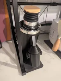 Cover for metal dosing cup