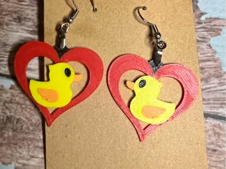 Rubber duck cutout heart earrings