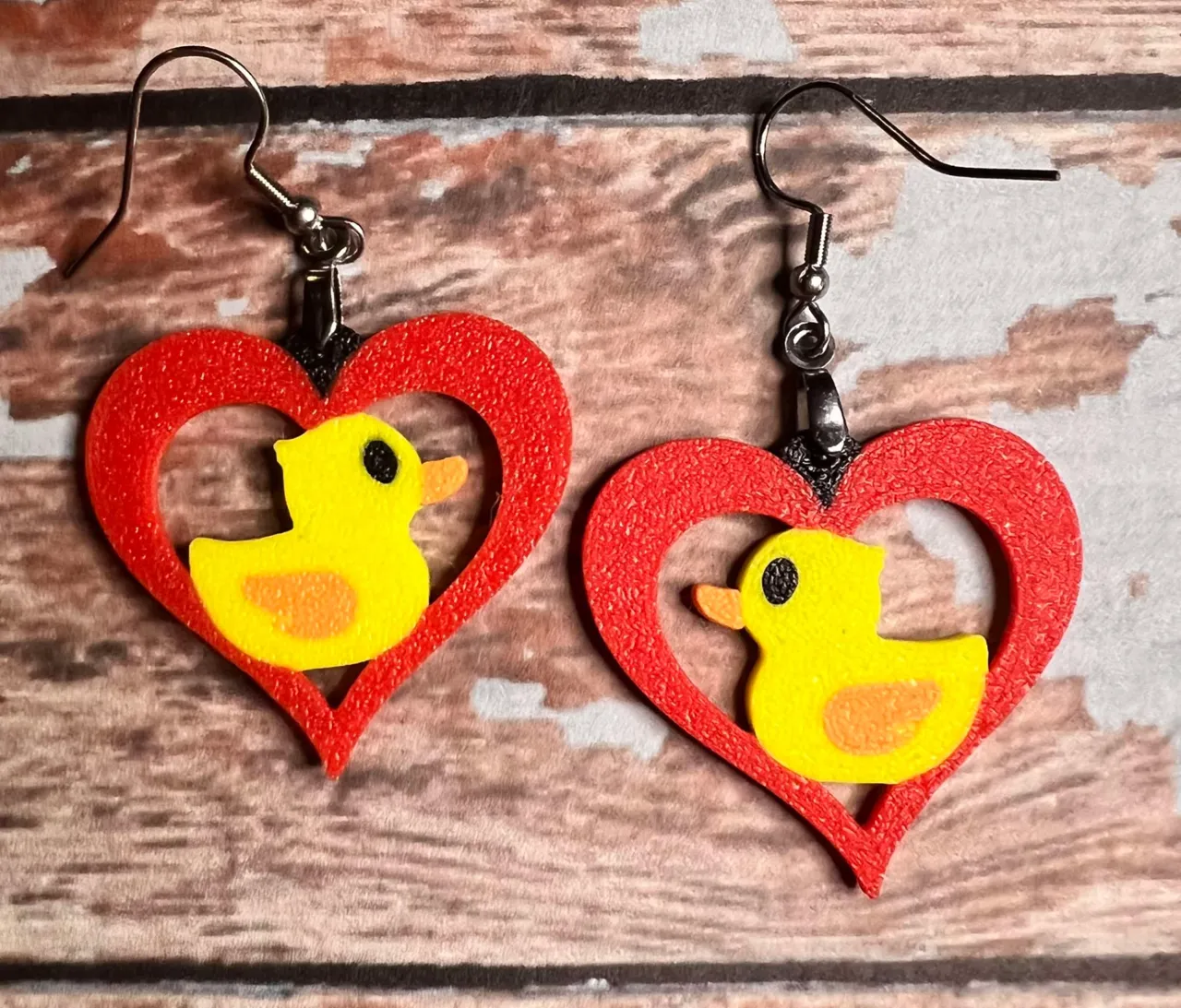 Rubber duck cutout heart earrings view 3