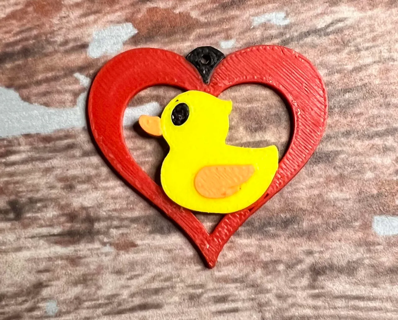 Rubber duck cutout heart earrings view 4