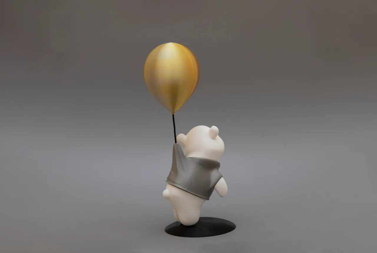 Cute figure of bear flying on balloon view 3