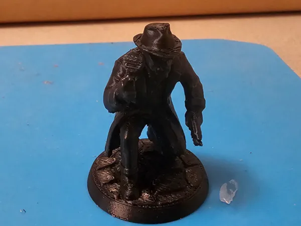Figurine détective privé