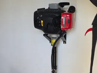 Lawn mower wall mount