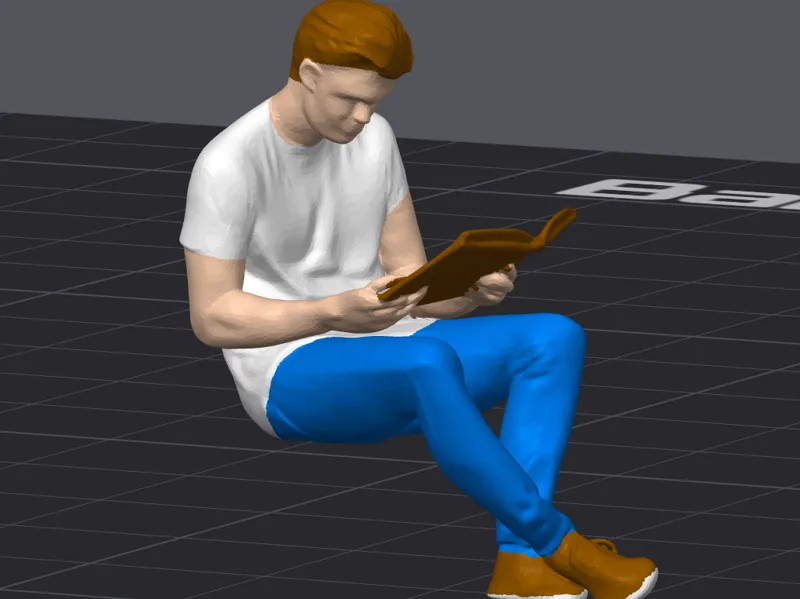 Uomo seduto che legge un libro per il tuo diorama