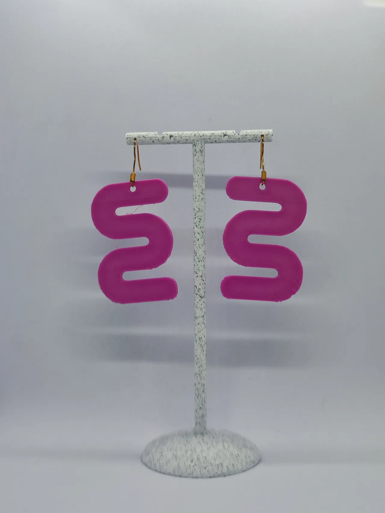 Aretes Movimiento Fluido view 2