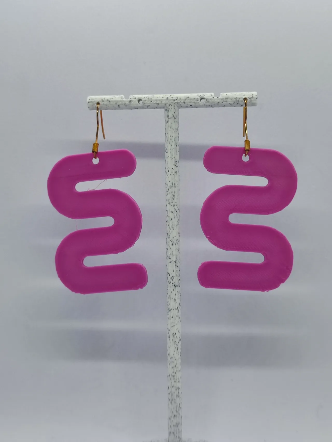 Aretes Movimiento Fluido view 3