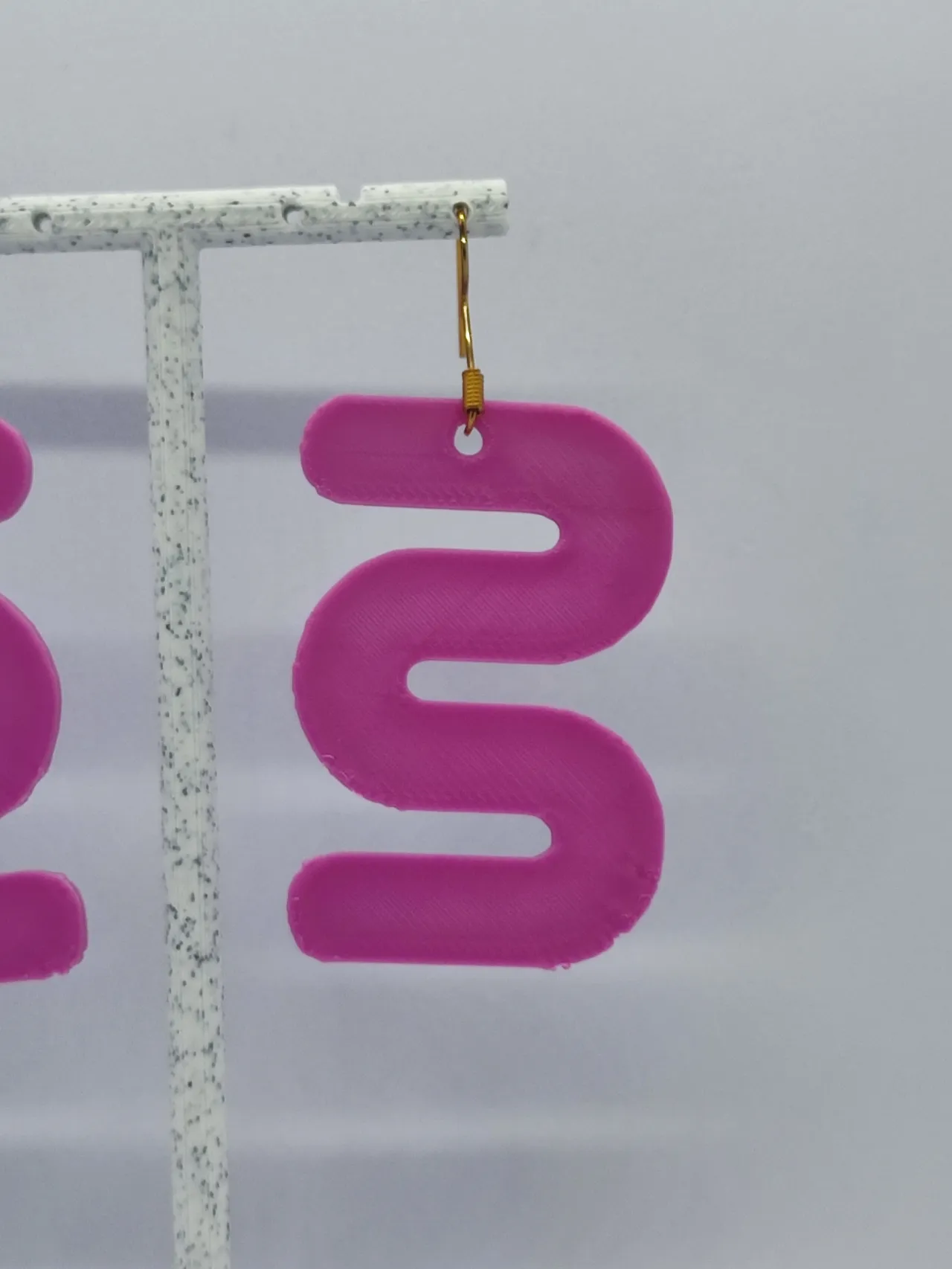 Aretes Movimiento Fluido view 4