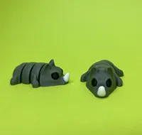 Bébé rhinocéros articulé — porte-clés — photo 2