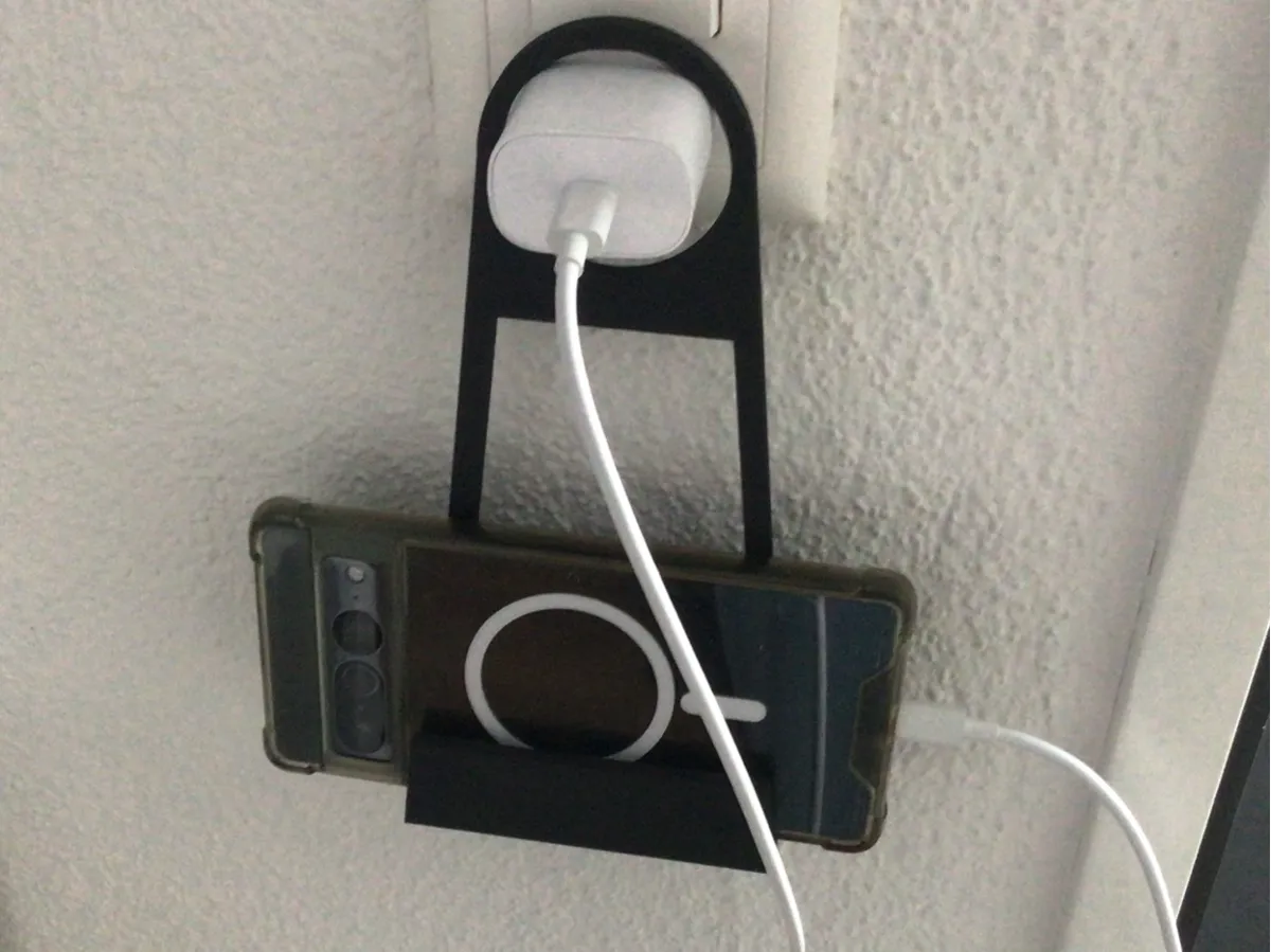 Support téléphone pour prise murale