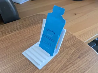 Makeup / skin care sample stand and organizer