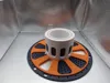 Spacer for gap between adapter and spool.