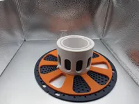 Spacer for gap between adapter and spool.