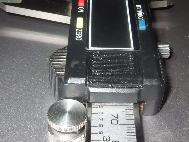 battery cap for caliper