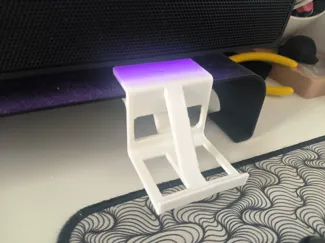 Phone stand on shelf