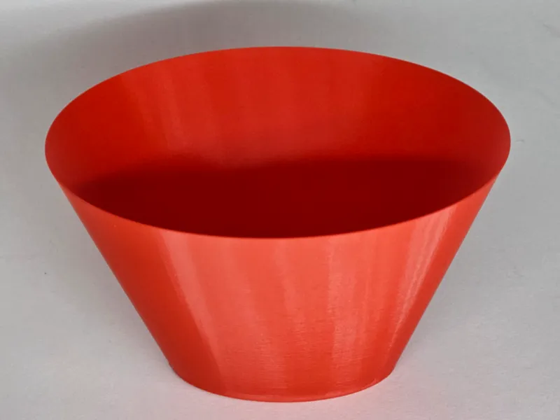Flexible desk sweeping bin