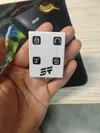 This version features a split-button design, making it easier to press, but it is not waterproof