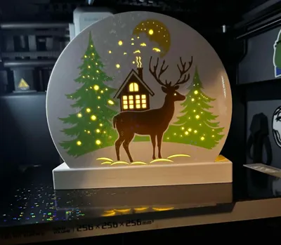 Christmas reindeer with forest and cottage scene 