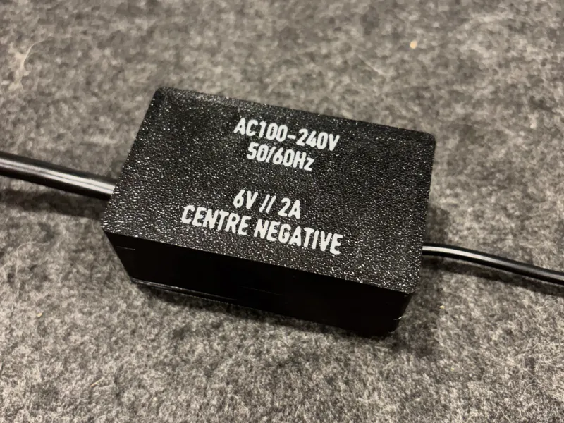 Housing for low voltage power supplies