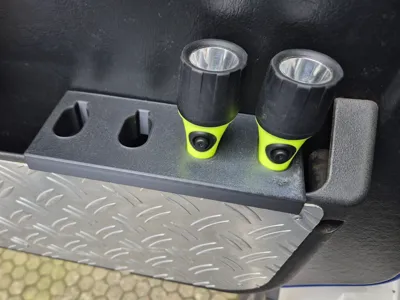 Lamp holder for MAN side compartment
