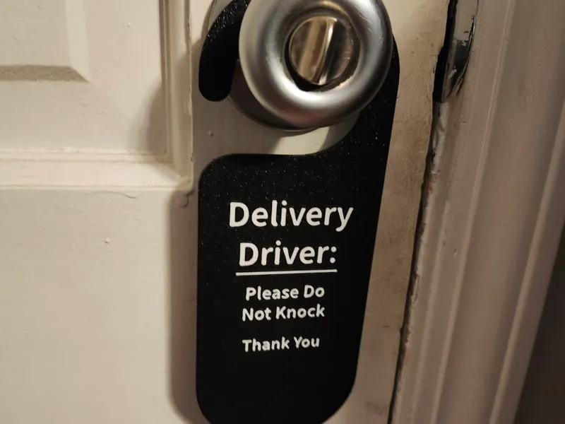 Do not knock door sign
