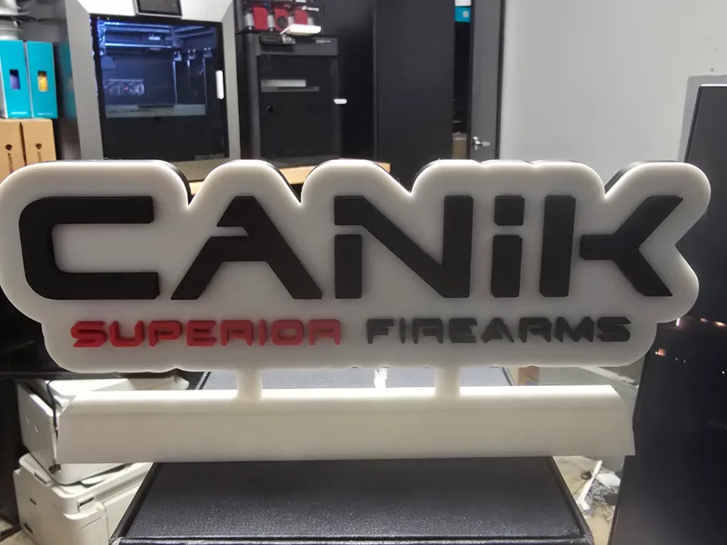 Canik logo sign stand