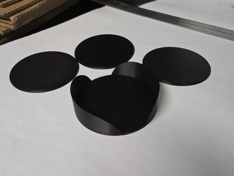 Set of coasters with a matching storage stand.