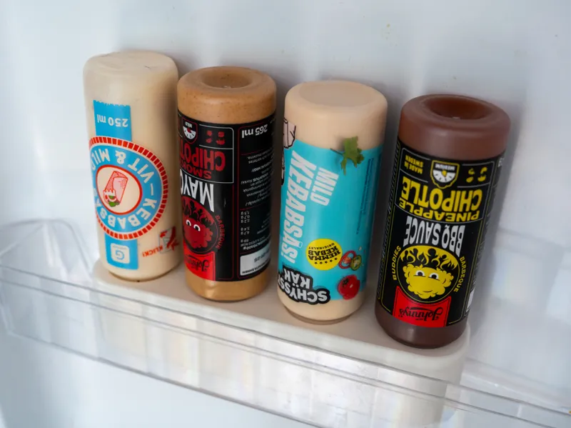 Holder for sauce bottles