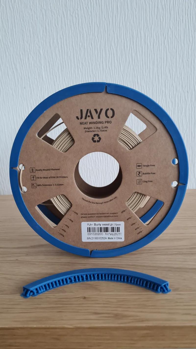 Cardboard spool rail
