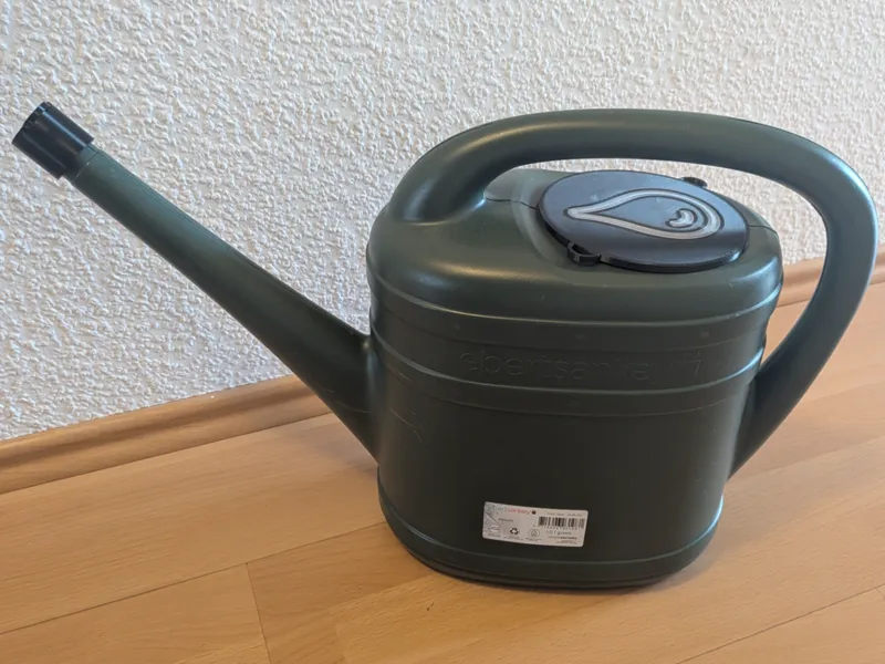 Gießkannenabedeckung