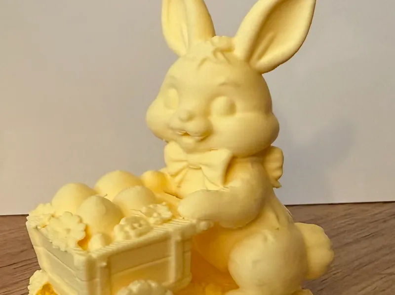 Osterhase mit Eierkarren