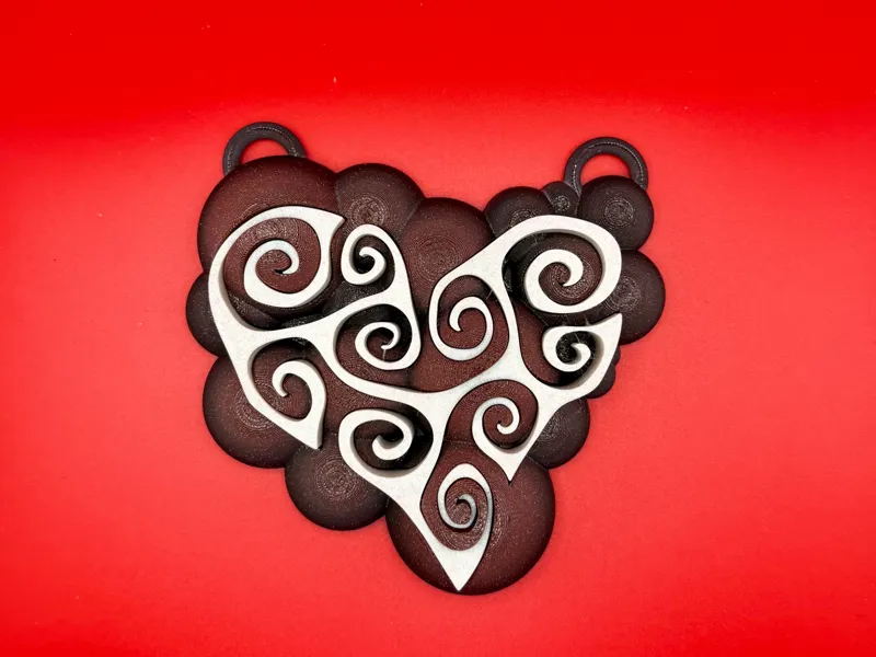 Spiral heart plaque