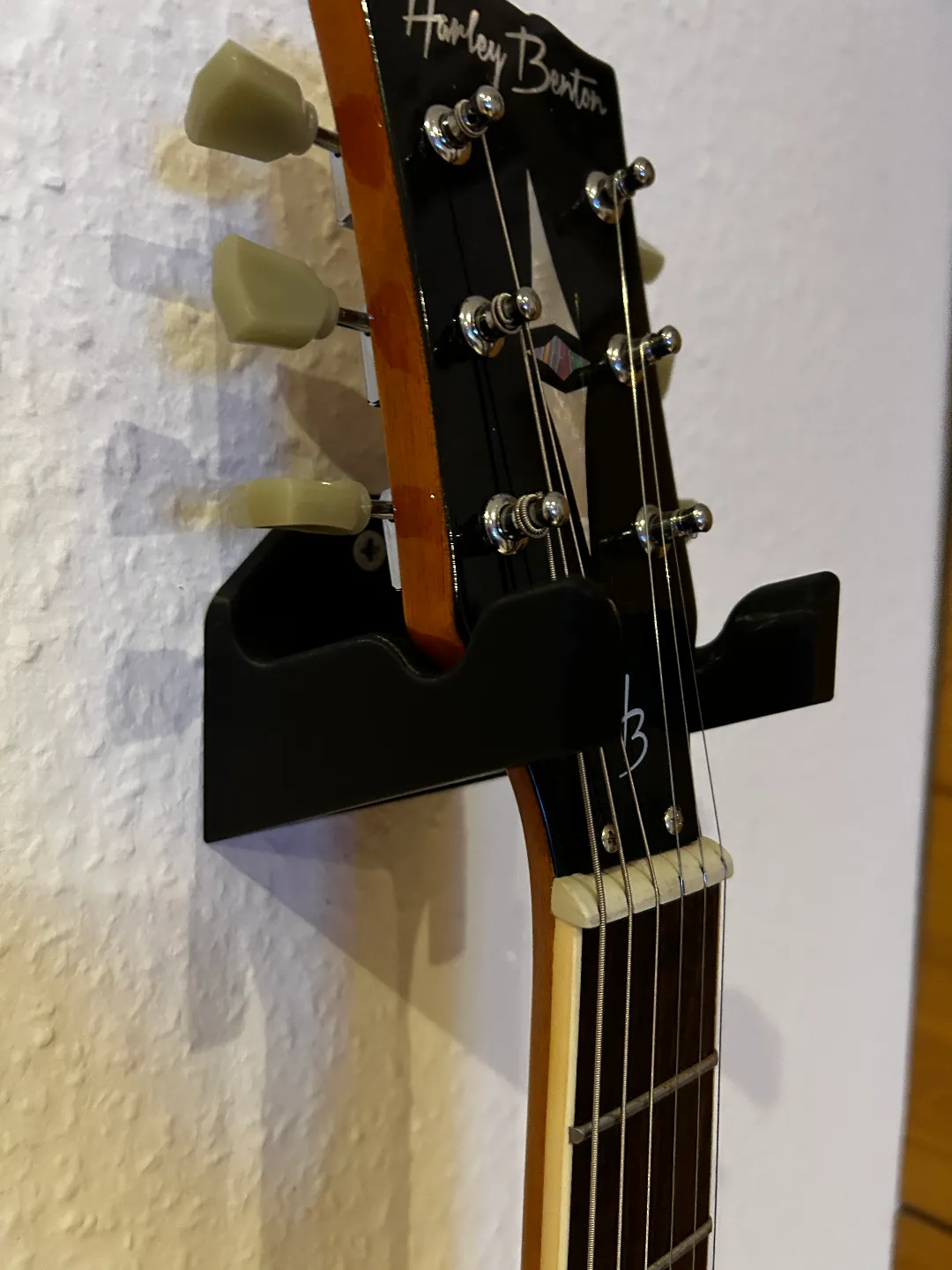 Support mural pour guitare