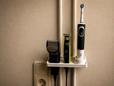 Bathroom shelf for razors and brushes