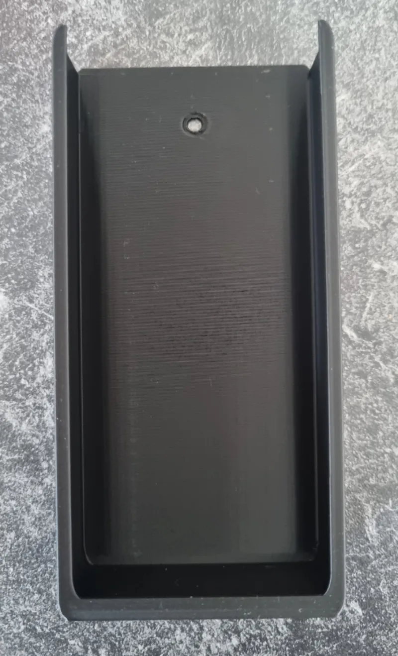 Wall mount for the remote control of a CARATEC TV