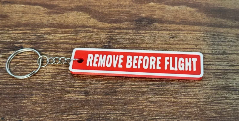 Remove Before Flight Keychain