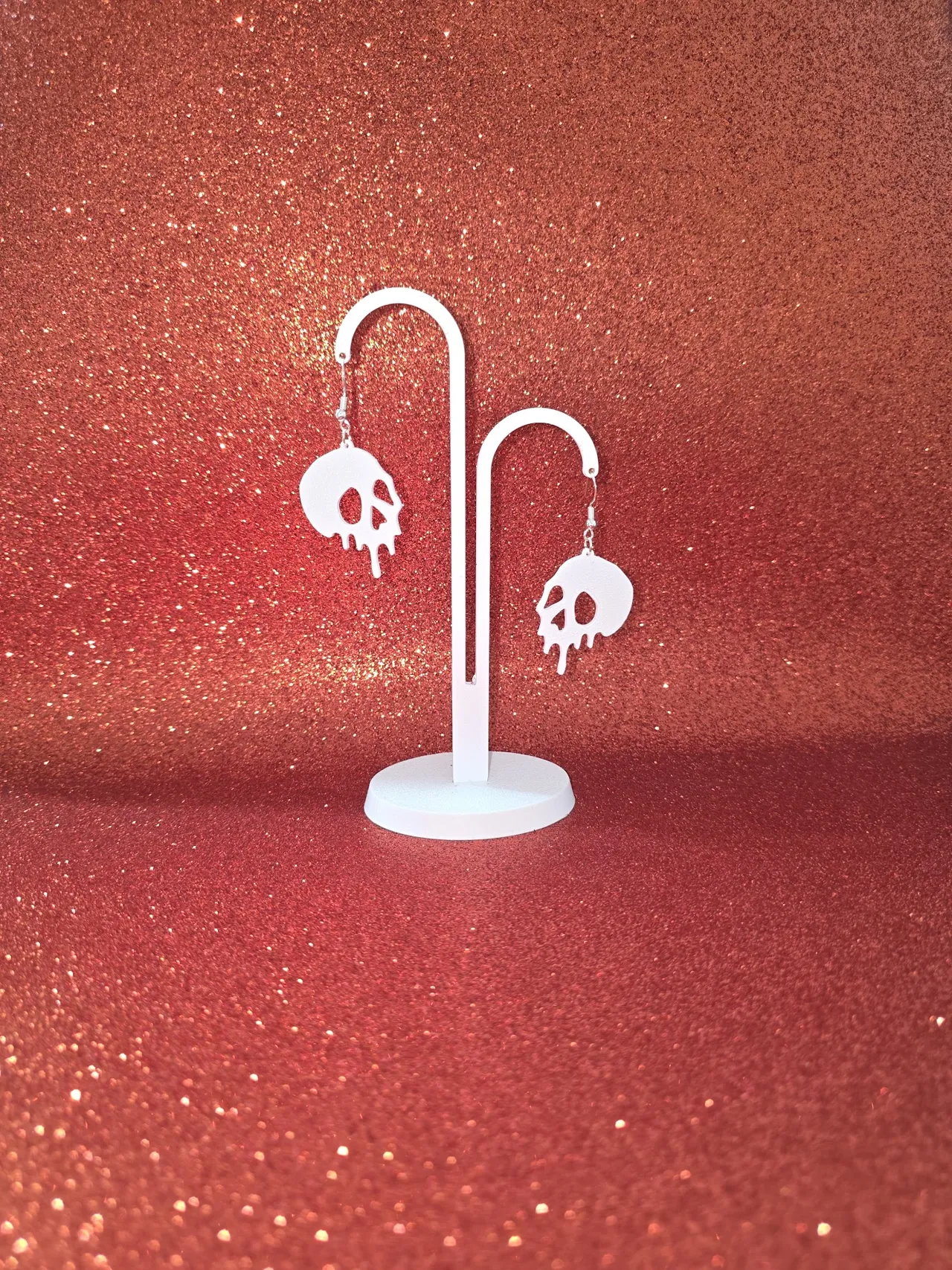 Loose skull earrings view 3