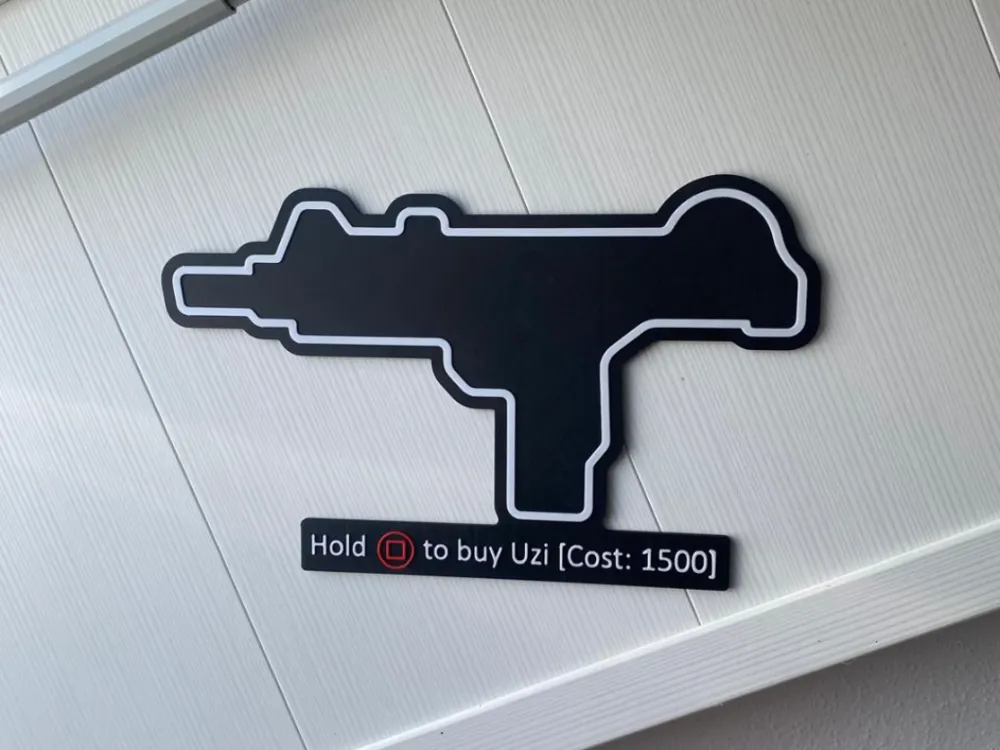 Letrero o emblema decorativo: Call of Duty Zombie Wandkauf Uzi. Referencia del modelo original.